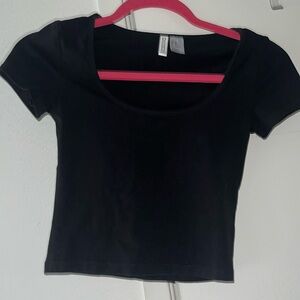 Cropped black scooped tee